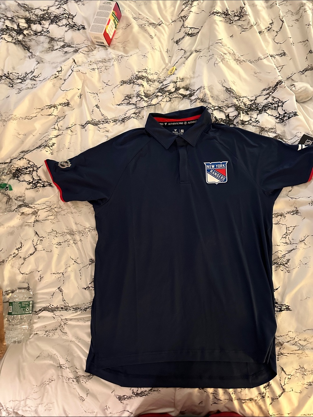 Fanatics Navy Polo with Red Sleeve Trim and New York Rangers Crest